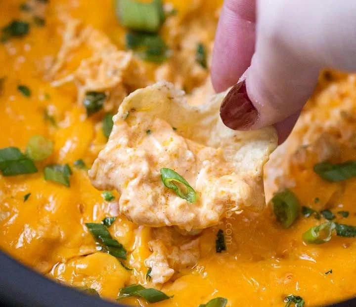 Delicious Buffalo Chicken Dip served in a bowl with tortilla chips