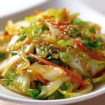 Colorful Asian cabbage stir fry featuring fresh vegetables and vibrant sauce