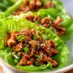 Delicious Asian chicken lettuce wraps filled with savory ingredients