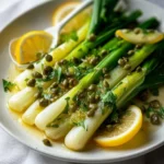Deliciously braised spring onions served as a side dish