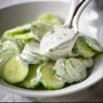 Creamy cucumber salad made with fresh cucumbers and a creamy dressing