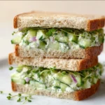 Cucumber salad sandwiches made with fresh vegetables and herbs