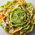 Delicious Frito Cowboy Cabbage with Fritos and veggies in a bowl