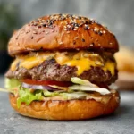 Juicy smash burger with crispy edges and fresh toppings served on a plate