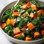 Roasted sweet potato kale salad with vibrant ingredients in a bowl