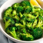 Delicious sautéed broccoli with garlic and herbs in a skillet