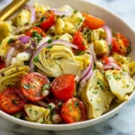 Tuscan artichoke tomato salad with fresh vegetables and herbs