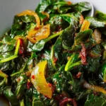 Vegan Fried Collard Greens served on a plate with garnishes