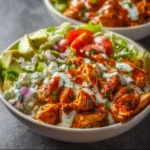 Delicious Buffalo Chicken Bowl with toppings and spices
