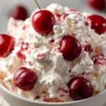 Delicious Cherry Cheesecake Fluff dessert with fresh cherries and cream cheese