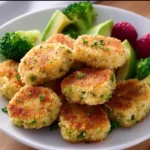 Chicken and Broccoli Nuggets 3 Delicious Chicken Broccoli Nuggets on a plate, ideal for a healthy snack or meal