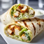 Chicken Caesar Wrap 2 Delicious Chicken Caesar Wrap with chicken, romaine lettuce, and Caesar dressing
