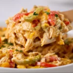 Delicious Chicken Fajita Casserole topped with colorful peppers and cheese