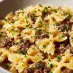Garlic Butter Bowtie Pasta with Ground Beef served in a bowl