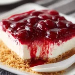 No-Bake Cherry Yum Yum Dessert 3 Delicious no-bake Cherry Yum Yum dessert with layers of cherry and cream.