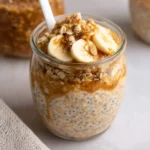Bowl of brown sugar overnight oats topped with fruit and nuts