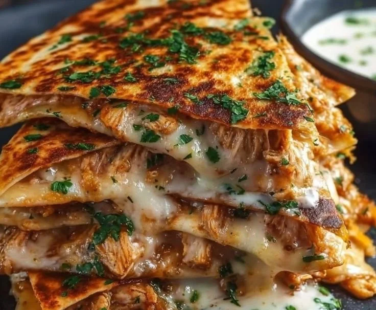 Cheesy hot honey chicken quesadillas served with dipping sauce