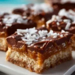 Homemade Coconut Toffee Bars with toffee and coconut toppings
