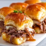 Delicious French Dip sliders served with au jus for dipping.