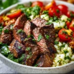 Mediterranean Steak Bowl with fresh vegetables and herbs