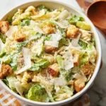 Delicious Pasta Caesar Salad with creamy dressing and fresh ingredients