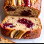 Peanut butter and jelly banana bread loaf fresh out of the oven