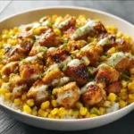 Delicious Street Corn Chicken Bowl topped with cilantro and lime