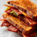 TLT Sandwich made with crispy tempeh, fresh lettuce, and ripe tomatoes