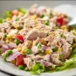 Delicious viral tuna salad served in a bowl with fresh ingredients.