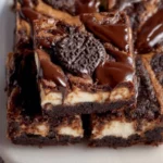 Delicious brownie cheesecake bars with rich chocolate and cream cheese layers