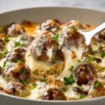 Delicious cheesy mushroom skillet dish served in a cast iron pan