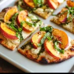 Delicious Peach Basil Naan Pizza with fresh ingredients and vibrant colors.