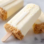 Delicious frozen cheesecake pops on a stick dessert