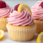 Delicious homemade lemon cupcakes with frosting and lemon zest on top