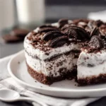 Delicious Oreo Cookie Ice Cream Cake with Oreo cookie crumbles on top
