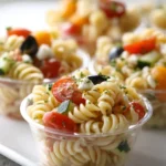 Colorful Pasta Salad Cups filled with veggies and dressing