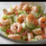 Delicious upgraded classic shrimp salad with fresh ingredients and vibrant colors.