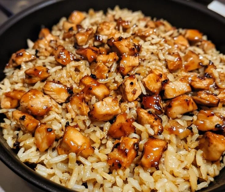 BBQ Chicken served with flavorful rice on a plate