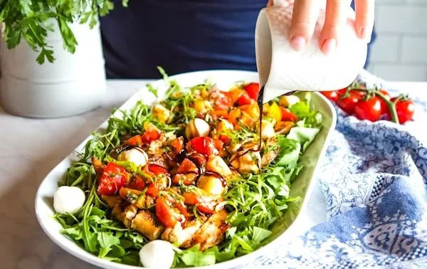 Delicious Bruschetta Chicken Salad with chicken, tomatoes, and basil ingredients