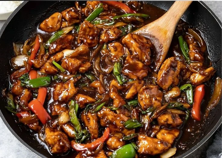 Delicious chicken in garlic sauce served on a plate