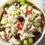 Creamy Greek Yogurt Chicken Salad served in a bowl with fresh vegetables