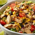 Healthy Southwest Chicken Salad with grilled chicken, fresh vegetables, and toppings