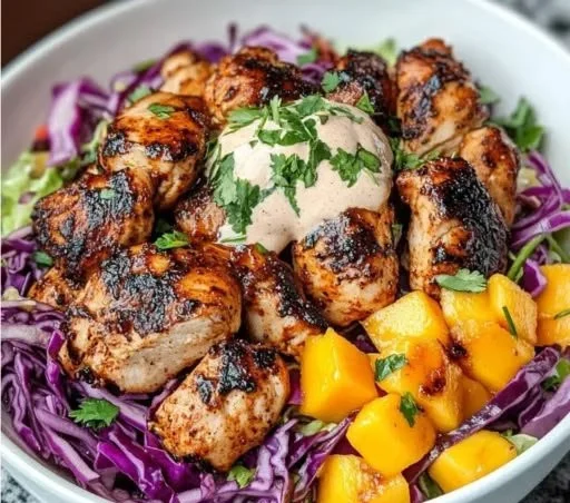 Jerk Chicken & Mango Slaw Bowls with Honey Lime Cream