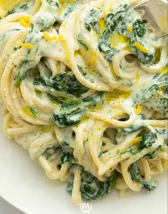 Delicious lemon ricotta pasta with spinach served in a bowl