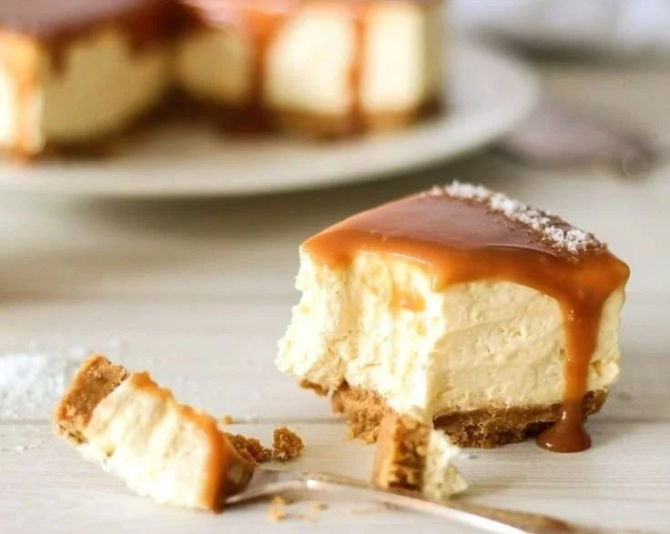 Delicious no bake salted caramel cheesecake topped with caramel drizzle