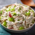 Delicious simple chicken salad served in a bowl with fresh ingredients
