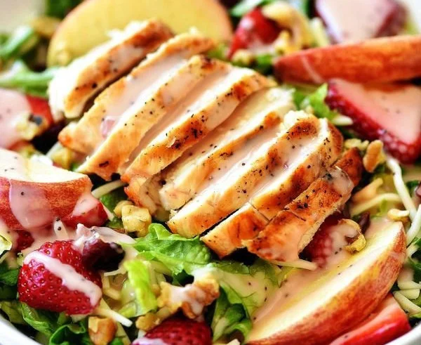 Strawberry Apple Grilled Chicken Salad served with vibrant ingredients