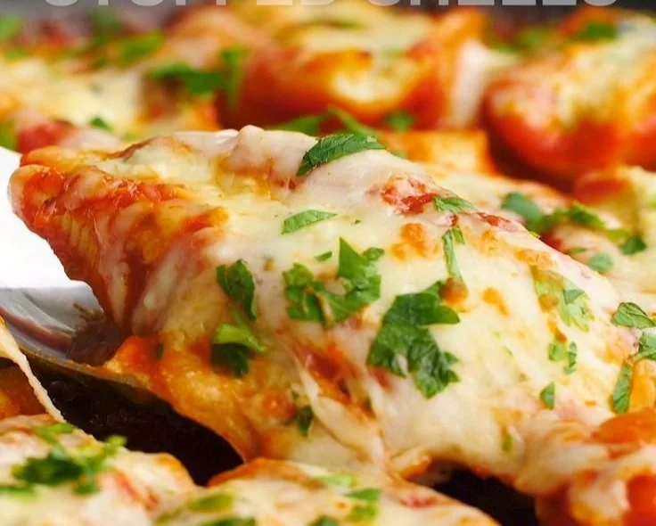 Delicious 4-cheese stuffed shells topped with marinara sauce