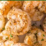 Air Fryer Garlic Parmesan Shrimp 3 Air fryer garlic parmesan shrimp served on a plate with herbs