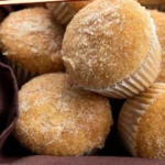 Apple Cider Muffins 3 Freshly baked apple cider muffins topped with a sprinkle of cinnamon